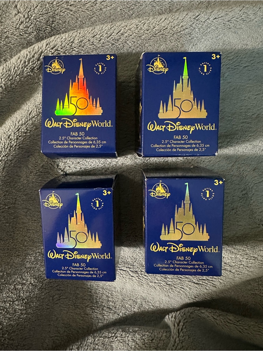 Disney FAB 50 Mystery Collectible Figures in Blue Boxes